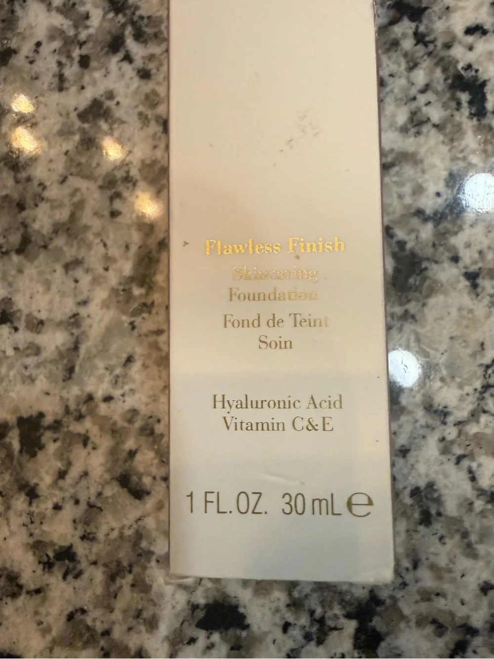 Elizabeth Arden Flawless Finish Skincaring Foundation - Neutral White Text